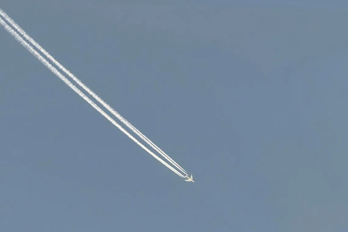 How airplane streaks in the sky supercharge global warming
