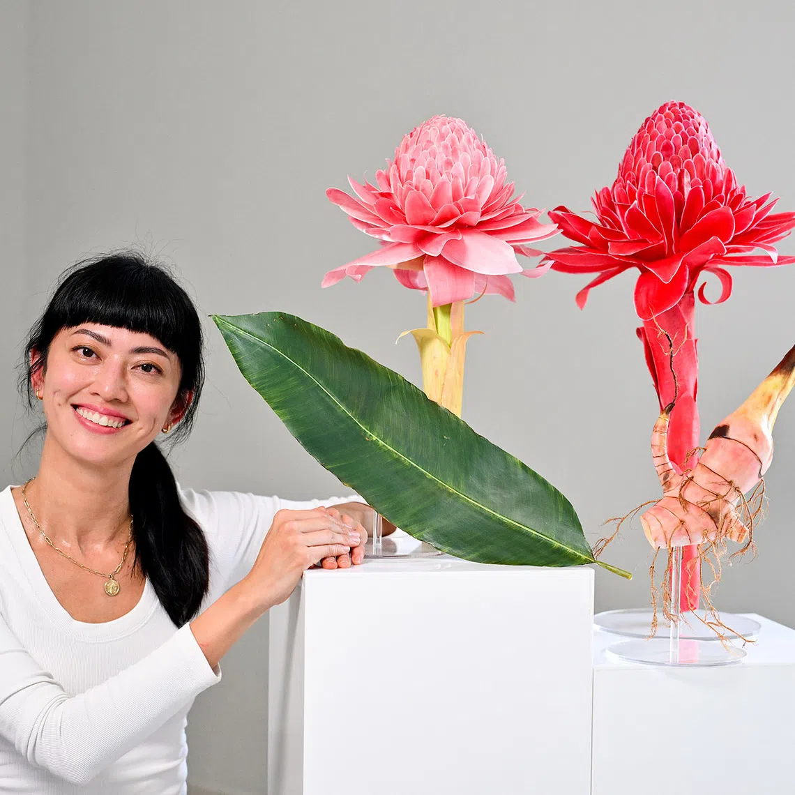 *SECOND MAIN PIX* ST20260825-202641200557-Lim Yaohui-yhpeili/ Paper artist Koh Pei Li with her Torch Ginger botanical sculpture which will be exhibited at Homo Faber 2026 in Venice, at New Bahru on Aug 25, 2026.  (ST PHOTO: LIM YAOHUI)
