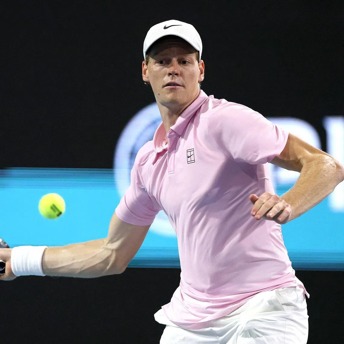 Jannik Sinner returns a shot to Alexander Zverev during their Miami Open semi-final.