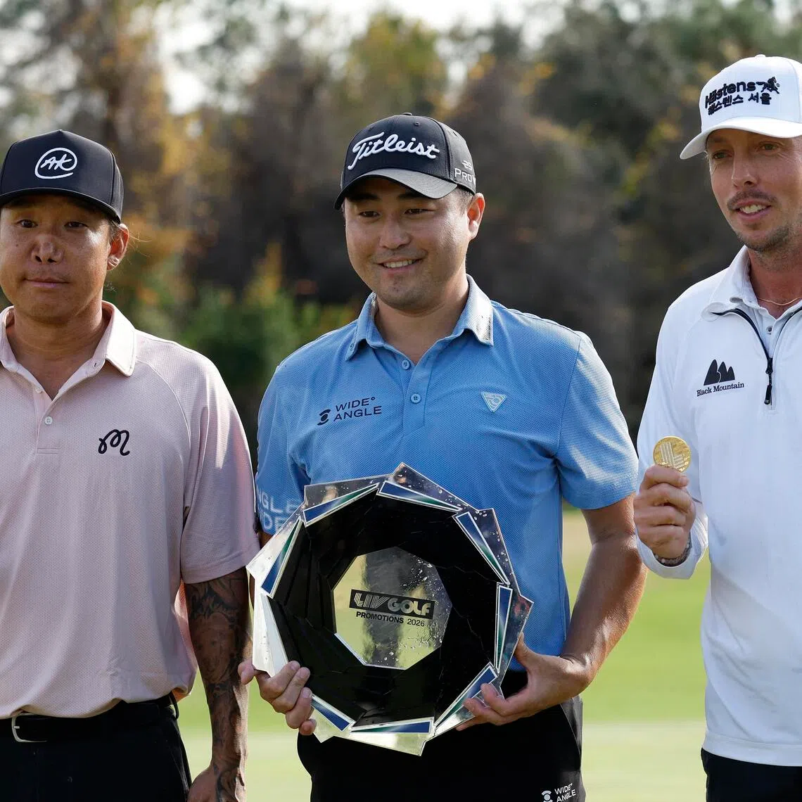 From left: Anthony Kim, Richard T. Lee and Bjorn Hellgren celebrating after taking the top three spots in the LIV Golf Black Diamond Ranch Promotions golf tournament at Black Diamond Ranch at Lecanto, Florida on Jan 11.
