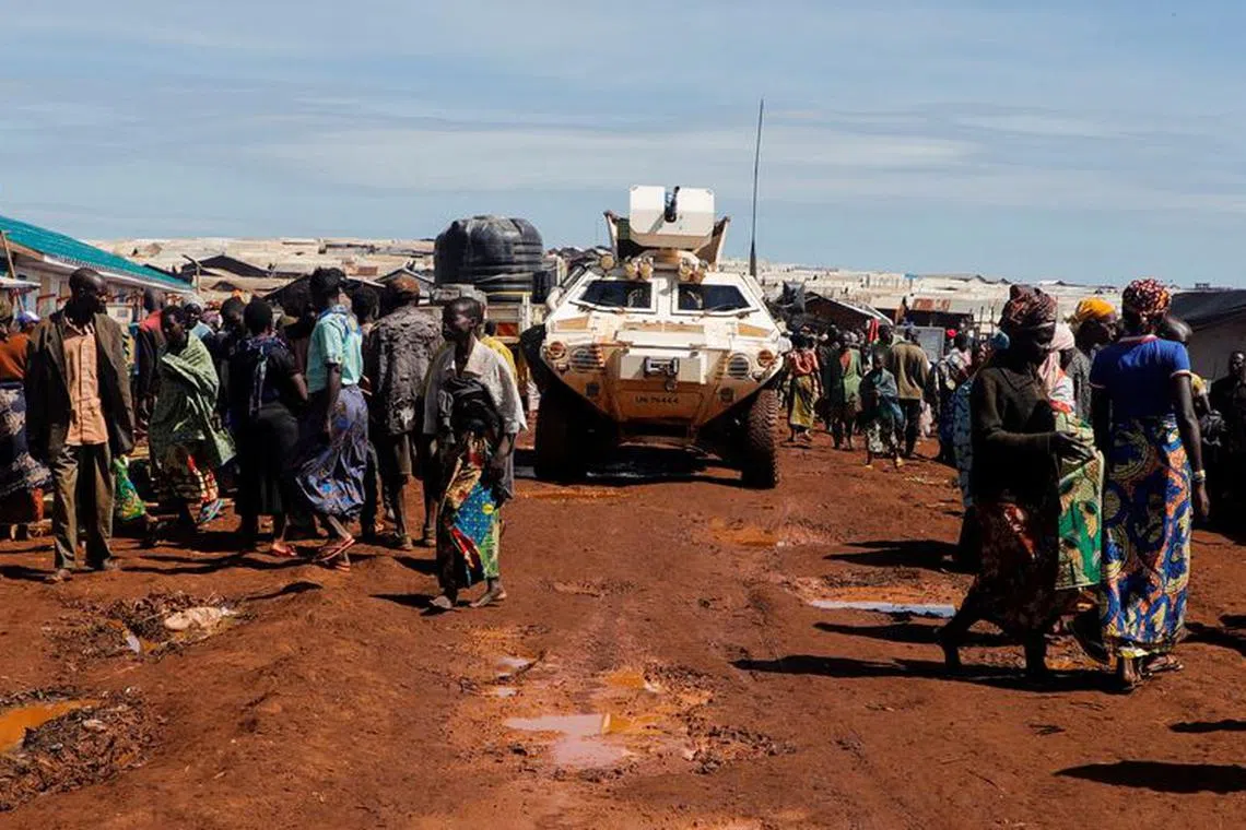 A United Nations Organization Stabilization Mission in the Democratic Republic of the Congo (MONUSCO) armoured personnel carrier (APC) drives through a road in Rhoe camp for the internally displaced people (IDPs) in Djugu's territory, Ituri's province, north-east of the Democratic Republic of Congo April 20, 2023. REUTERS/Paul Lorgerie/File Photo