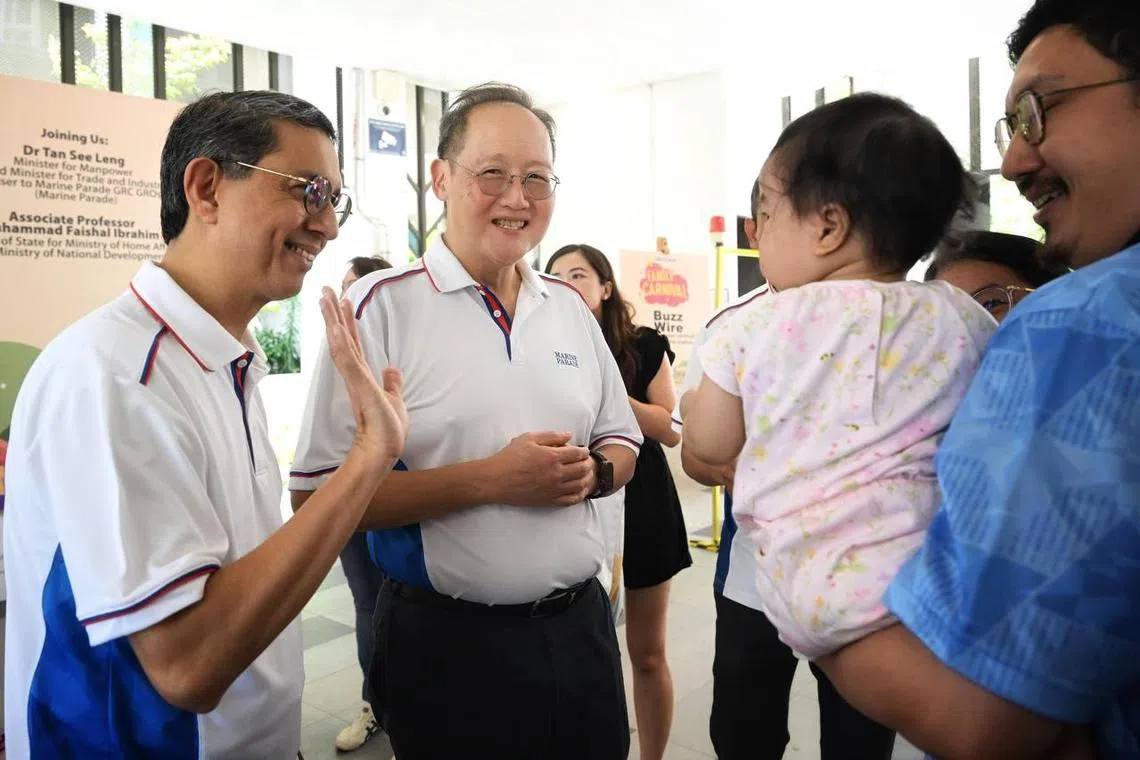 Minister of State for Home Affairs and National Development Muhammad Faishal Ibrahim and Manpower Minister Tan See Leng mingling with residents at the family carnival organised by Eunos Residents’ Network on April 12.