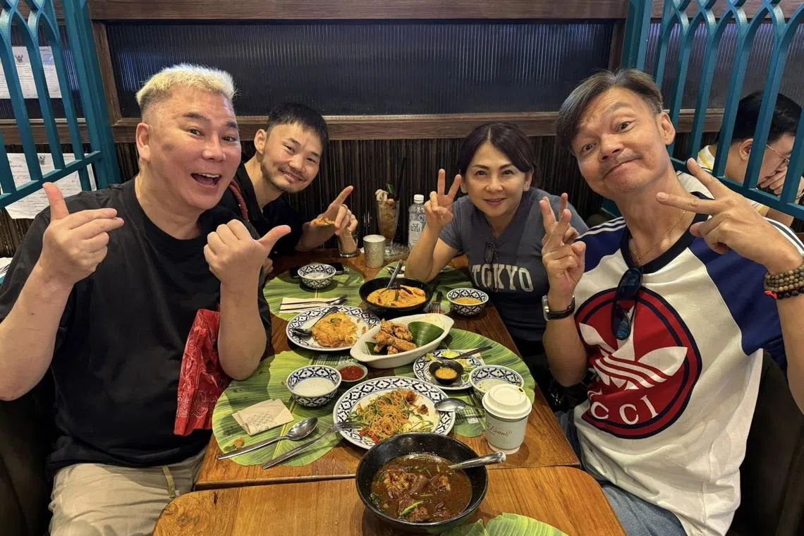 Addy Lee (left) shared on Facebook on May 16 a photo with Mark Lee (right), Mark Lee's wife Catherine Ng and a friend.