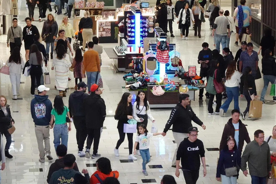 GLENDALE, CALIFORNIA - DECEMBER 26: People shop in the Glendale Galleria shopping mall on the day after Christmas on December 26, 2023 in Glendale, California. U.S. retail sales rose 3.1 percent year over year this holiday season, based on in-store and online purchases, according to Mastercard SpendingPulse.   Mario Tama/Getty Images/AFP (Photo by MARIO TAMA / GETTY IMAGES NORTH AMERICA / Getty Images via AFP)