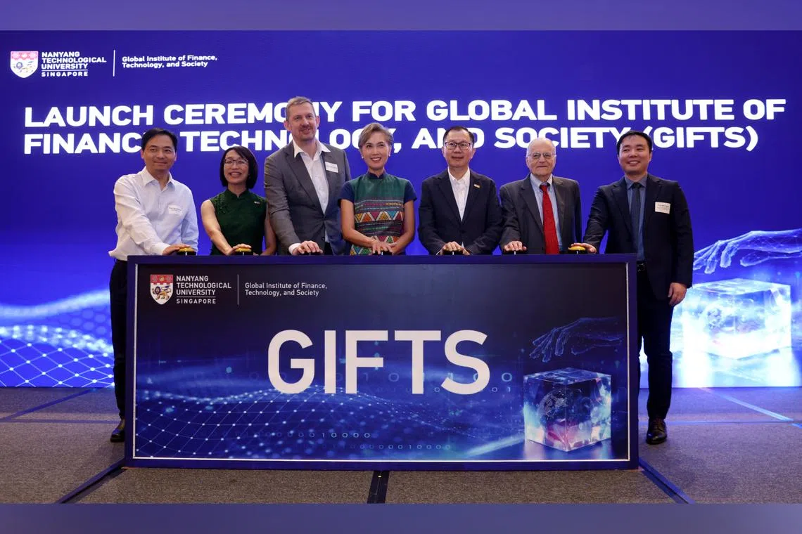Minister for Digital Development and Information Josephine Teo (centre) at the launch of the Global Institute of Finance, Technology, and Society on May 30.