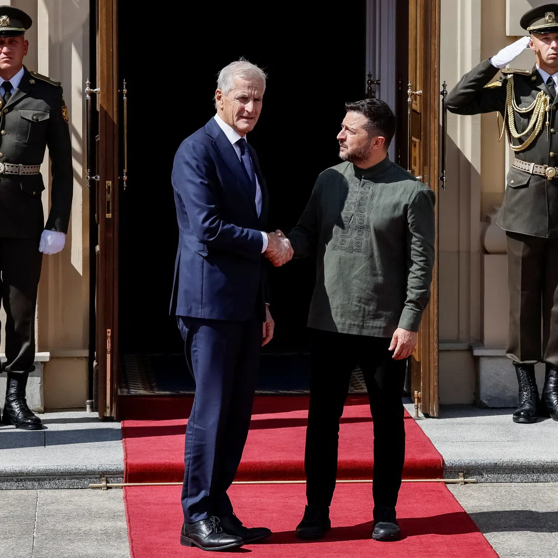 Ukraine’s President Volodymyr Zelensky greets Norway’s Prime Minister Jonas Gahr Stoere on Aug 23, before the Ukraine-Nordic-Baltic summit in Kyiv.