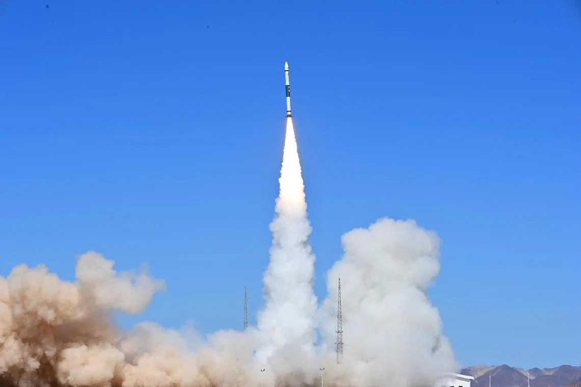 A Kuaizhou-1A carrier rocket blasts off from the Jiuquan Satellite Launch Center in northwest China, 20 July 2023.