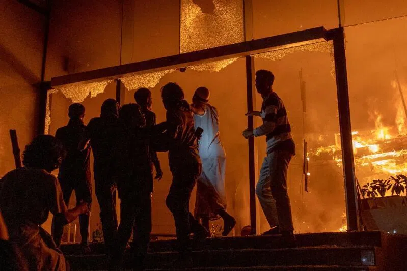 The Daily Star building in Dhaka aflame on Dec 19 as the death of a young activist leader sets off a political conflagration ahead of elections in February.