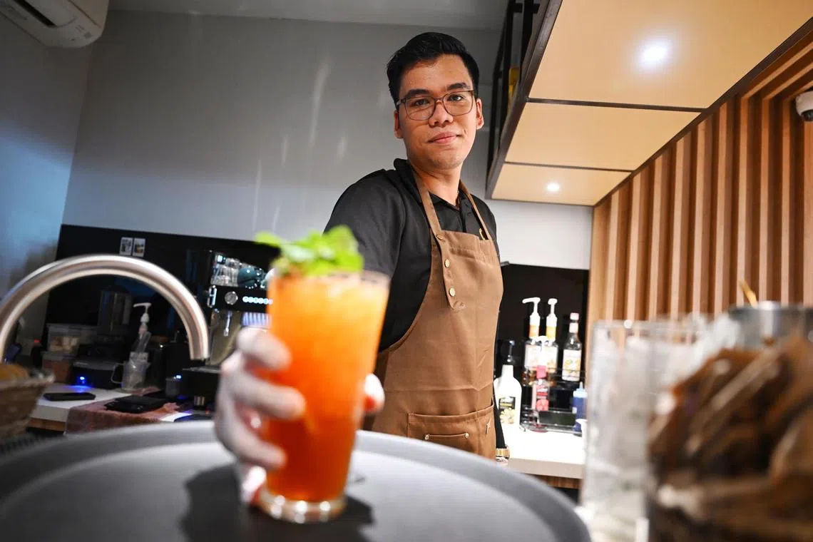 ST20240427_202435326489 thwork/Theresa Tan/Azmi Athni//

Irfan Fiqri, 20, an ITE West student in Technical Diploma in Hospitality Hotel Management, working as a service crew at the Pancake and Waffle Place cafe at Kandahar Street on Apr 27. 

ST PHOTO: AZMI ATHNI