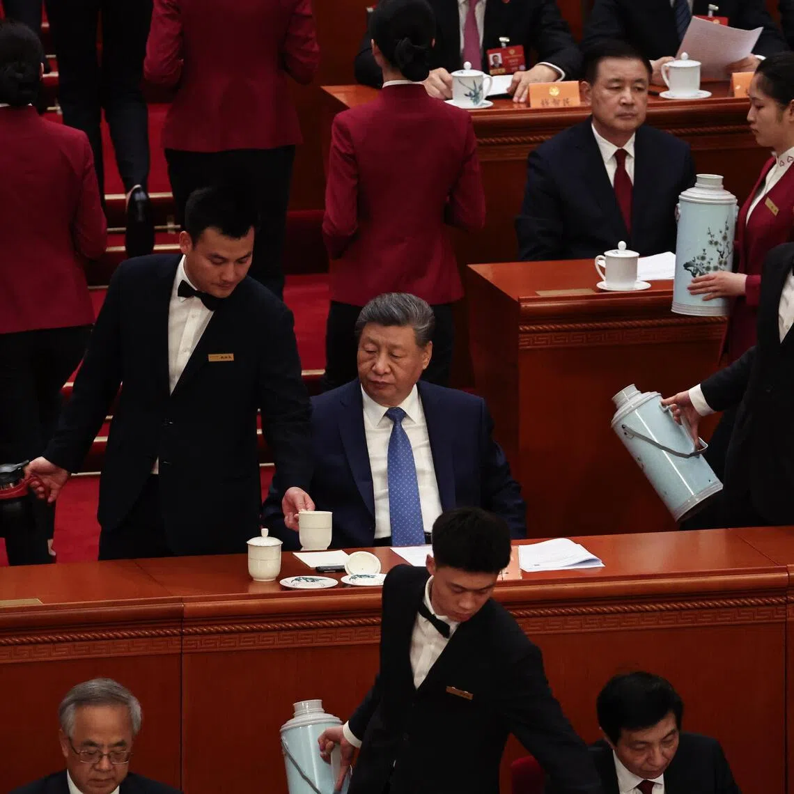 epa12794117 Staff members pour tea for Chinese President Xi Jinping (C) during the opening ceremony of the Fourth Session of the 14th Chinese People's Political Consultative Conference (CPPCC) National Committee at the Great Hall of the People in Beijing, China, 04 March 2026. China's major annual political meetings, known as the 'Lianghui' or 'Two Sessions,' begin on 04 March with the opening of the Chinese People's Political Consultative Conference (CPPCC), while the National People's Congress (NPC) will open on 05 March.  EPA/JESSICA LEE