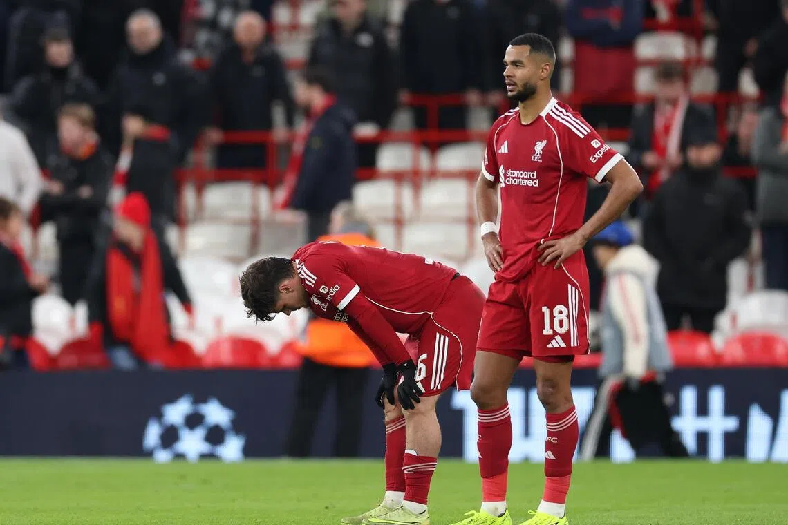 Liverpool's Milos Kerkez (left) and Cody Gakpo react after losing to PSV Eindhoven at Anfield on Nov 26.