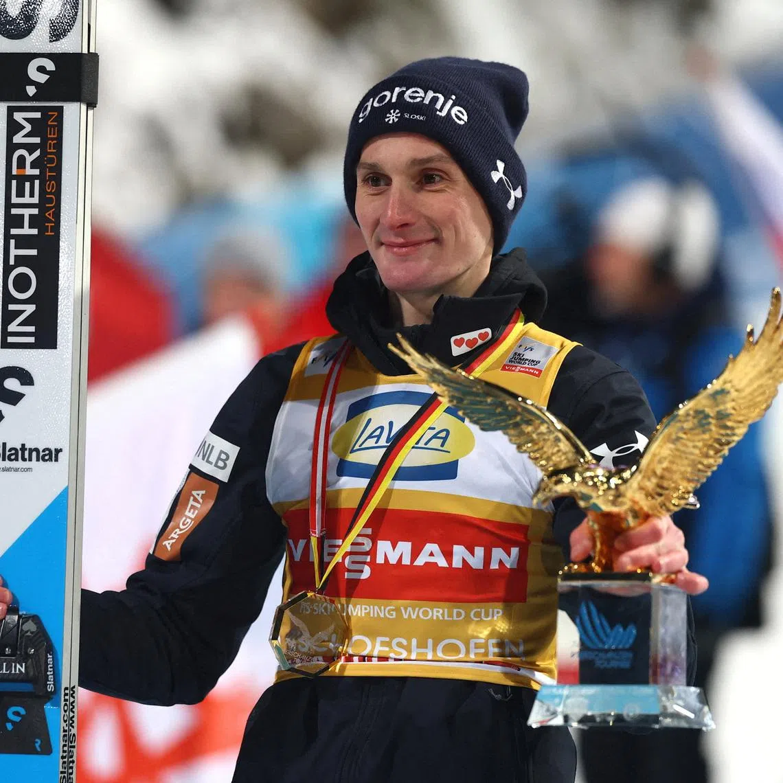 Ski Jumping - Four Hills Tournament - Bischofshofen, Austria - January 6, 2026 Slovenia's Domen Prevc celebrates with the Golden Eagle trophy after winning the Four Hills tournament REUTERS/Kai Pfaffenbach