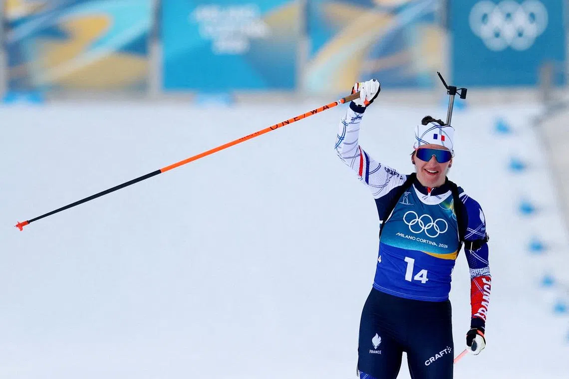 Milano Cortina 2026 Olympics - Biathlon - Mixed Relay 4 x 6km (M+W) - Anterselva Biathlon Arena, South Tyrol, Italy - February 08, 2026.  Julia Simon of France reacts as Team France wins the gold medal at the Biathlon Mixed Relay 4 x 6km (M+W) . REUTERS/Matthew Childs