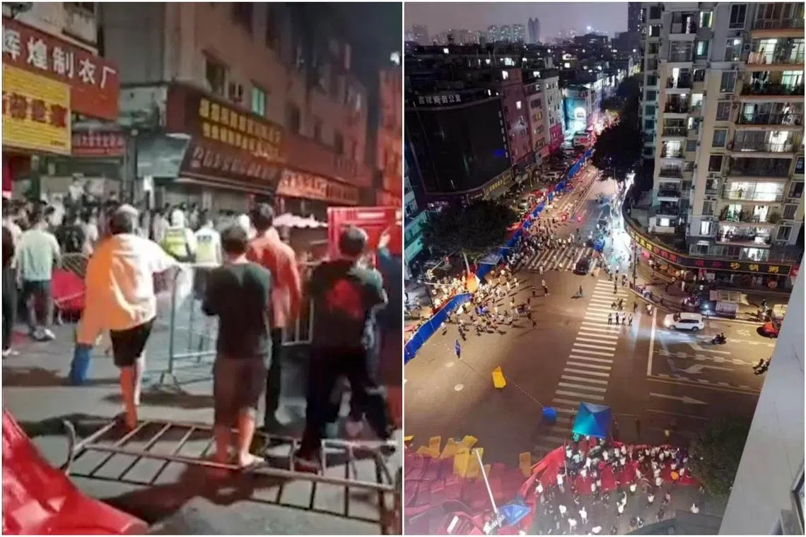 Videos showed people charging down streets and remonstrating with white hazmat-suit-clad workers in Guangzhou’s Haizhu district.