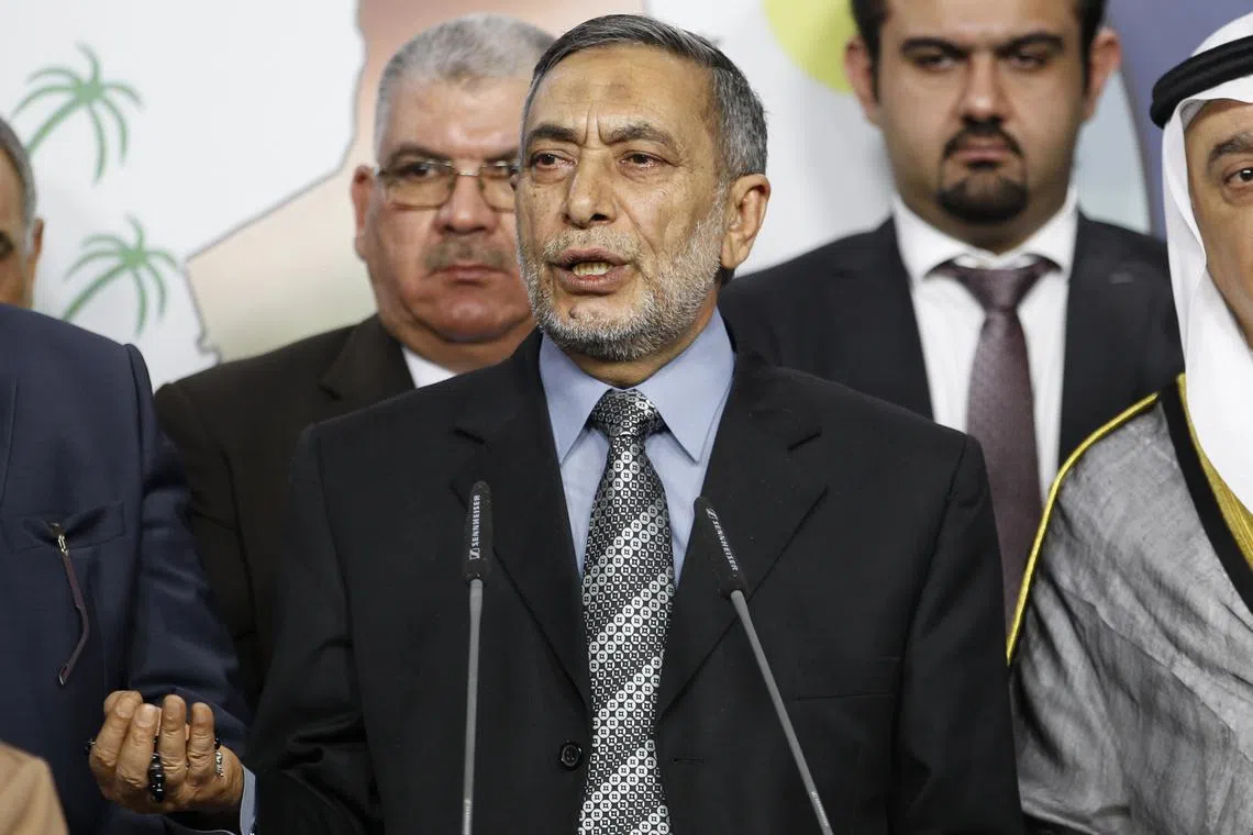FILE PHOTO: Iraqi Sunni lawmaker Mahmoud al-Mashhadani speaks during a news conference in Baghdad August 23, 2014. REUTERS/Thaier al-Sudani/File Photo