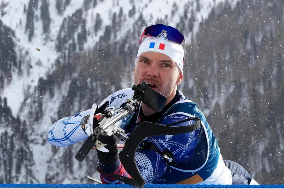 Milano Cortina 2026 Olympics - Biathlon - Men's 15km Mass Start - Anterselva Biathlon Arena, South Tyrol, Italy - February 20, 2026. Emilien Jacquelin of France in action during the men's 15km mass start REUTERS/Pawel Kopczynski