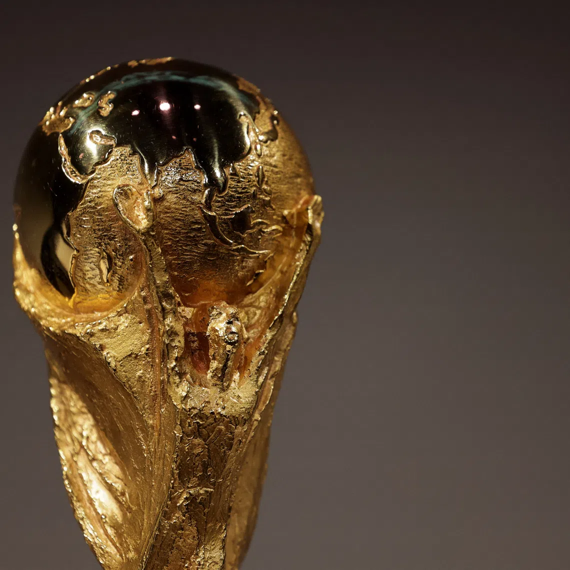 Soccer Football - FIFA World Cup 2026 - Panel with FIFA legends ahead of World Cup Draw - John F. Kennedy Center for the Performing Arts, Washington, D.C., U.S. - December 3, 2025 The World Cup Trophy is displayed at the event REUTERS/Jeenah Moon