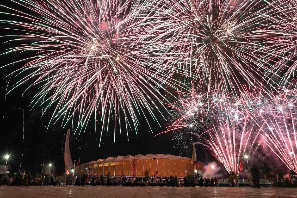 Fireworks explode during the closing ceremony of the 32nd Southeast Asian Games (SEA Games) at the Morodok Techo National Stadium in Phnom Penh on May 17.