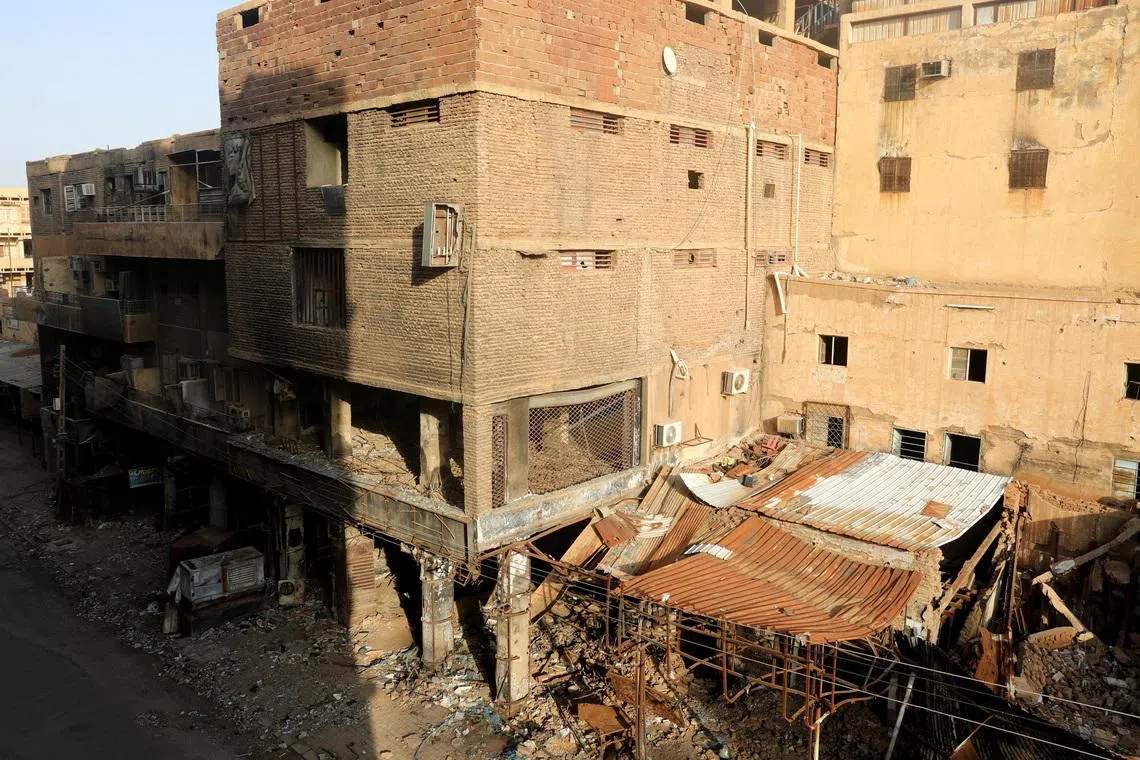 FILE PHOTO: Burnt shops lies down closed in downtown in Khartoum, Sudan June 25, 2026. REUTERS/El Tayeb Siddig/File Photo