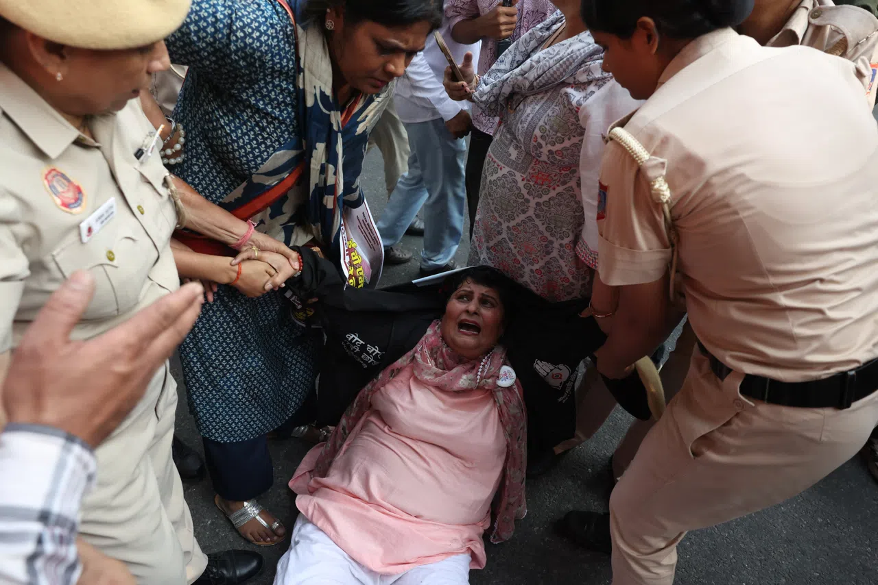 Police detaining a supporter of India’s main opposition Congress party in New Delhi, India, on Sept 25, during a protest demanding resignation of India’s chief election commissioner Gyanesh Kumar.
