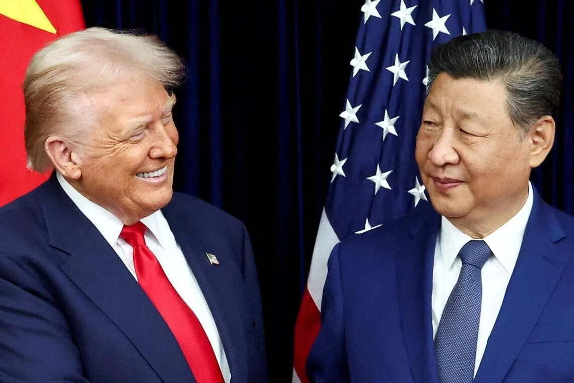 US President Donald Trump and Chinese President Xi Jinping at the bilateral meeting  on the sidelines of the APEC summit in Busan, South Korea, on Oct 30, 2025. Mr Trump will visit Beijing on May 14-15.