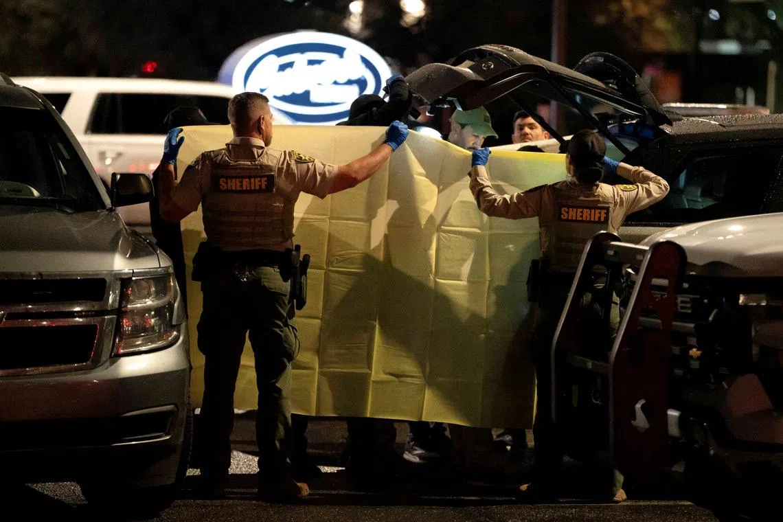 The FBI and Pima County Sheriff’s Department deputies process evidence from a late-model, gray Range Rover as they investigate the disappearance of Nancy Guthrie, the 84-year-old mother of U.S. journalist and television host Savannah Guthrie, at a Culver’s in Tucson, Arizona, U.S. February 13, 2026.  REUTERS/Rebecca Noble     TPX IMAGES OF THE DAY