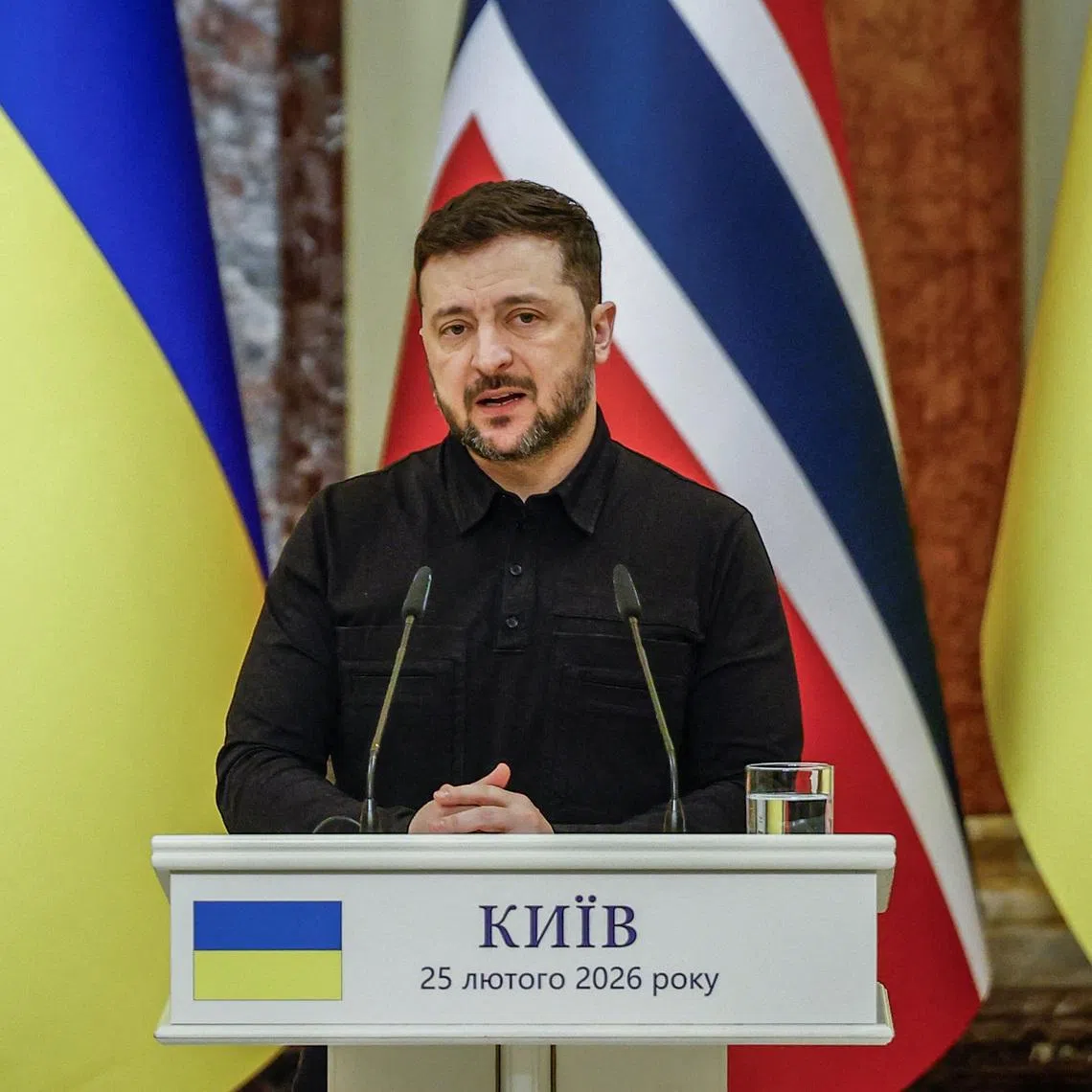 FILE PHOTO: Ukraine's President Volodymyr Zelenskiy talks as he attends a joint press conference with Norway's Prime Minister Jonas Gahr Stoere (not pictured), amid Russia's attack on Ukraine, in Kyiv, Ukraine February 25, 2026. REUTERS/Alina Smutko/File Photo