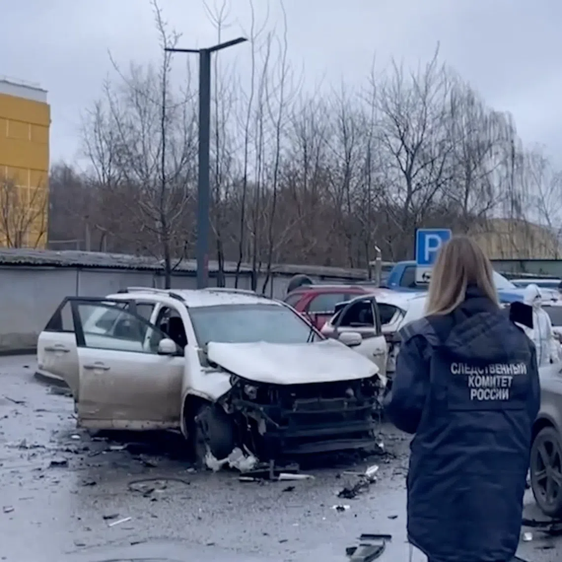 An investigator works at the scene where Lieutenant General Fanil Sarvarov, head of the Russian General Staff's army operational training directorate, was reportedly killed in a car bomb in Moscow, Russia, December 22, 2025, in this still image taken from video. Russia's Investigative Committee/Handout via REUTERS