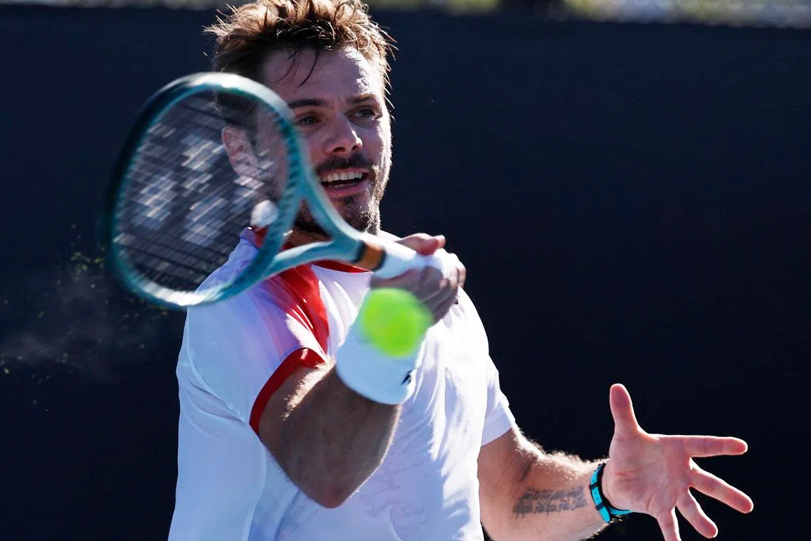 Tennis - Australian Open - Melbourne Park, Melbourne, Australia - January 14, 2025 Switzerland's Stan Wawrinka in action during his first round match against Italy's Lorenzo Sonego REUTERS/Tingshu Wang