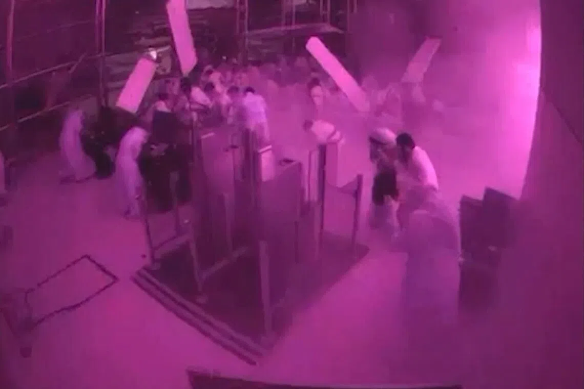 This screen grab taken from CCTV footage released by the Saudi Media Ministry on Oct 11, 2026, shows the moment Riyadh International was hit by a Houthi strike on Oct 10, 2026.