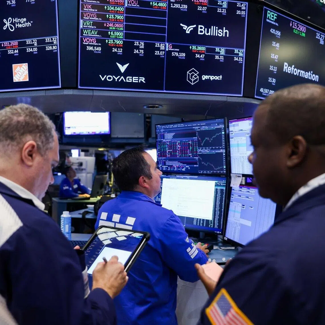 Traders working on the floor of the New York Stock Exchange, in New York City, on July 31.