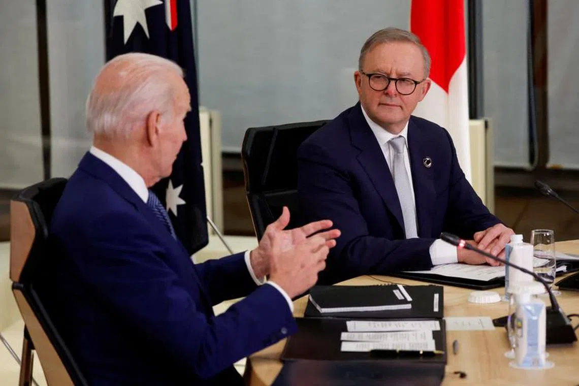 FILE PHOTO: U.S. President Joe Biden and Australia's Prime Minister Anthony Albanese attend a Quad meeting on the sidelines of the G7 summit, at the Grand Prince Hotel in Hiroshima, Japan, May 20, 2023. REUTERS/Jonathan Ernst/Pool/File Photo