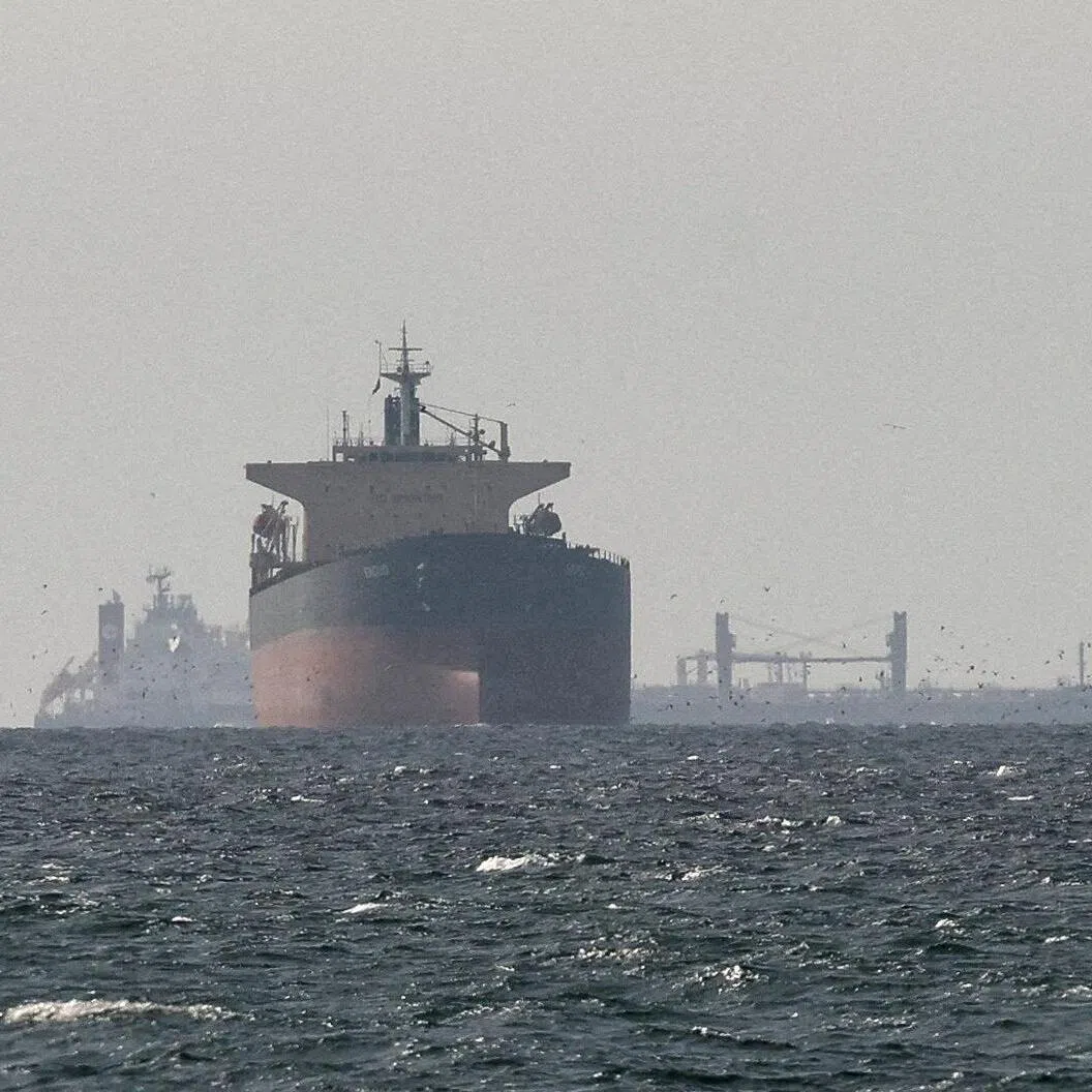 Cargo ships in the Gulf near the Strait of Hormuz, as seen from northern Ras al-Khaimah in United Arab Emirates.