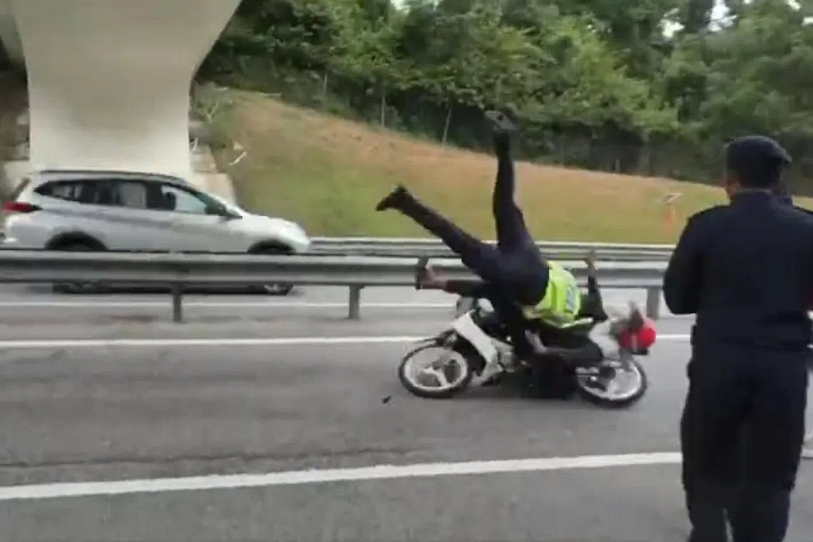 A video clip of the incident showed the motorcyclist crashing into the officer, sending him flying several metres. 