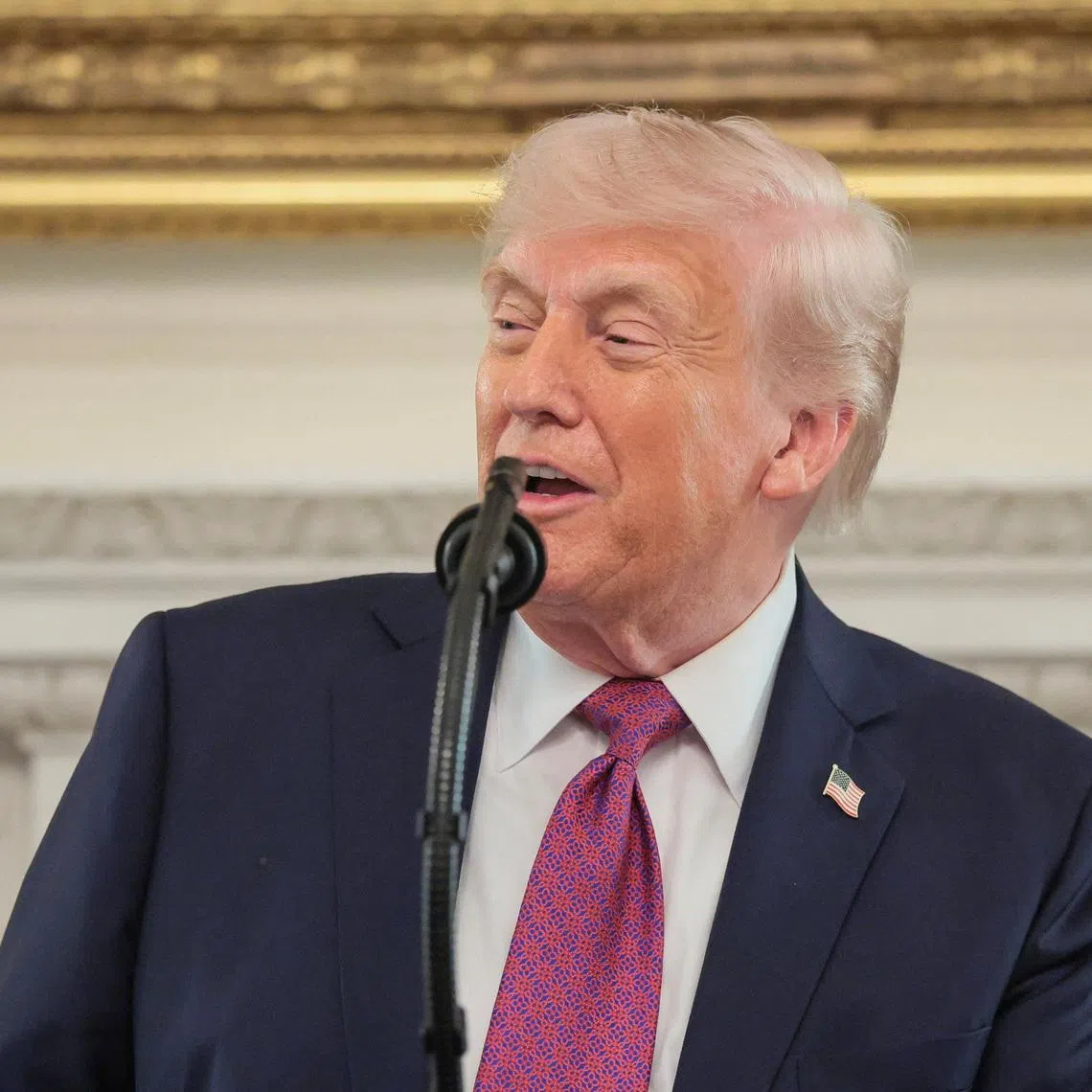 U.S. President Donald Trump delivers remarks to NCAA Collegiate National Champions in the State Dining Room at the White House in Washington, D.C., U.S., April 21, 2026. REUTERS/Kylie Cooper