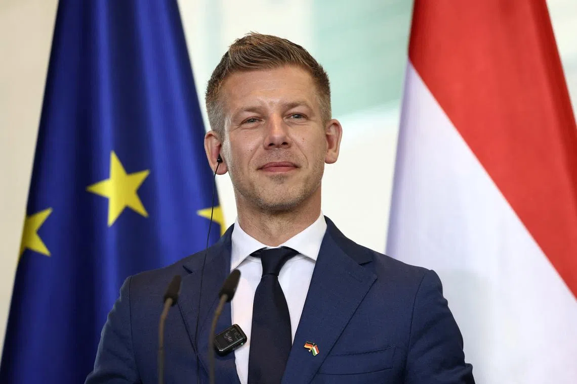 Hungary's Prime Minister Peter Magyar attends a press conference with German Chancellor Friedrich Merz at the Chancellery in Berlin, Germany, June 2, 2026. REUTERS/Nadja Wohlleben