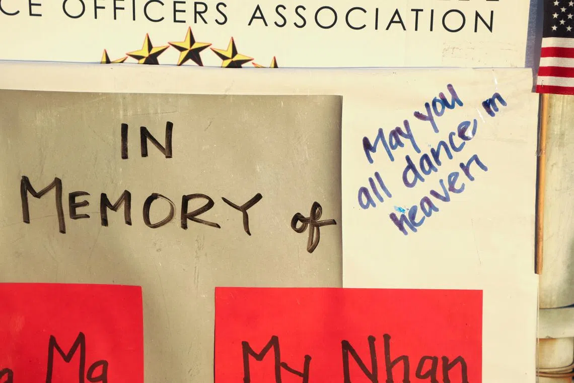 A view of a sign in memoriam is seen as people gather for a candlelight vigil after a mass shooting during Chinese Lunar New Year celebrations in Monterey Park, California, U.S. Jan 24, 2023. 