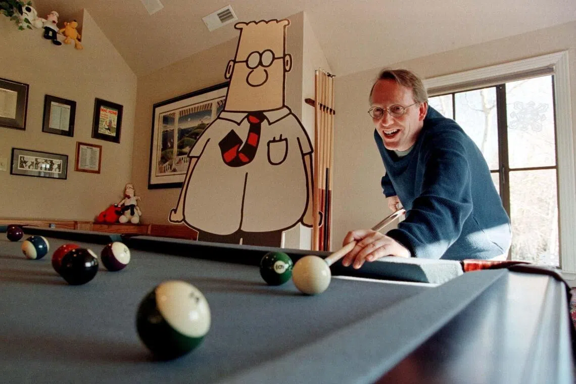 Scott Adams (right) with his comic book creation Dilbert at his home in California, US.