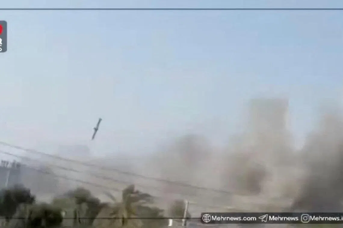 A still image from video shows what experts say appears to be a US Tomahawk missile hitting near the Shajareh Tayyebeh girls' school in Minab, Hormozgan province, Iran, on Feb 28. 