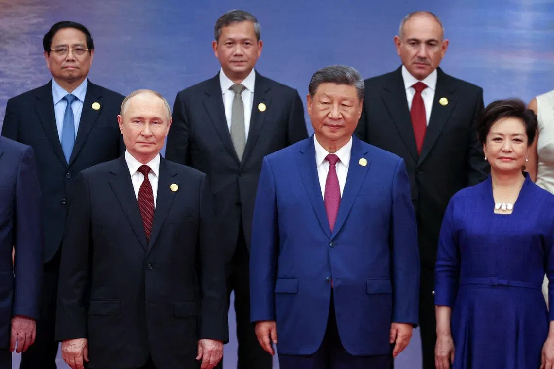 Leaders and officials, including Chinese President Xi Jinping and Russian President Vladimir Putin, attend a photo ceremony at the Shanghai Cooperation Organisation (SCO) summit in Tianjin, China August 31, 2025. Sputnik/Alexander Kazakov/Pool via REUTERS ATTENTION EDITORS - THIS IMAGE WAS PROVIDED BY A THIRD PARTY.
