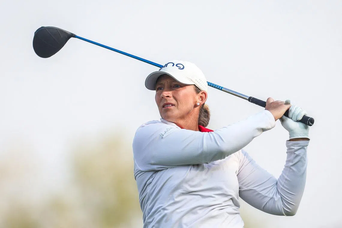 FILE PHOTO: Aug 24, 2018; Regina, Saskatchewan, CAN; Angela Stanford plays her shot from the 13th tee during the second round of the Canadian Pacific Women's Open golf tournament at Wascana Country Club. Mandatory Credit: Sergei Belski-USA TODAY Sports/File Photo