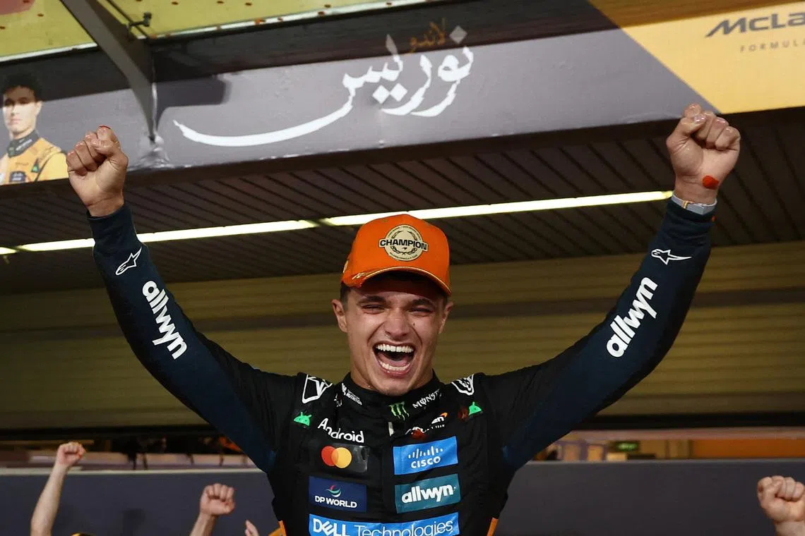 FILE PHOTO: Formula One F1 - Abu Dhabi Grand Prix - Yas Marina Circuit, Abu Dhabi, United Arab Emirates - December 7, 2025 McLaren's Lando Norris celebrates after becoming the 2025 Formula One World Champion REUTERS/Amr Alfiky/File Photo