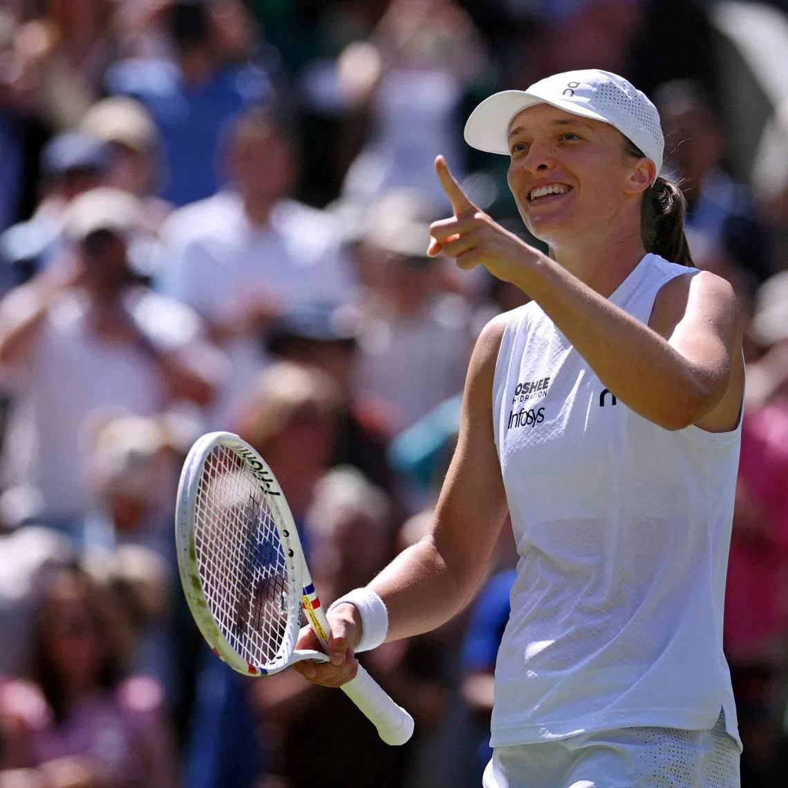 Tennis - Wimbledon - All England Lawn Tennis and Croquet Club, London, Britain - July 2, 2026 Poland's Iga Swiatek celebrates after winning her second round match against Czech Republic's Karolina Pliskova REUTERS/Jaimi Joy/File Photo