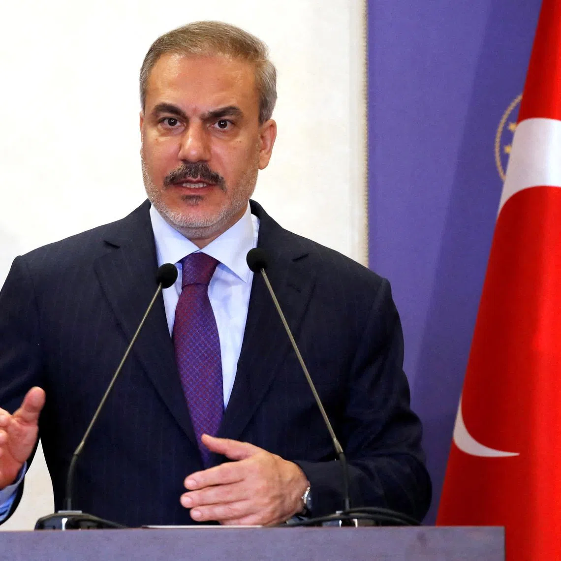 FILE PHOTO: Turkish Foreign Minister Hakan Fidan speaks during a press conference in Istanbul, Turkey, October 19, 2024. REUTERS/Dilara Senkaya/File Photo