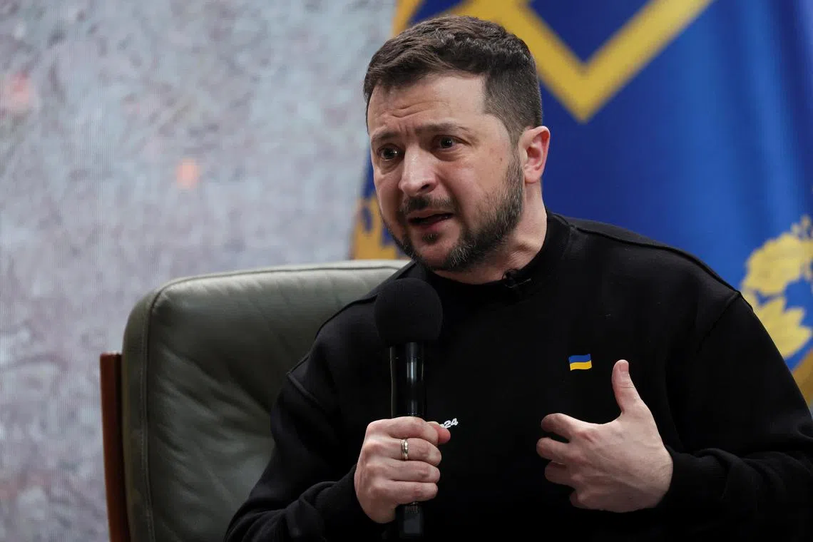Ukraine's President Volodymyr Zelensky attends a news conference on the first anniversary of Russian invasion of Ukraine,  in Kyiv.