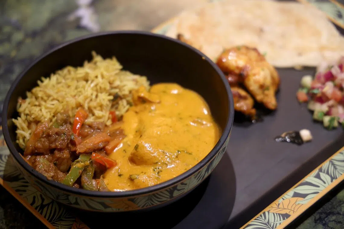 Mowgli’s Eatery, inspired by The Jungle Book (1967), serves Indian cuisine on board the ship.