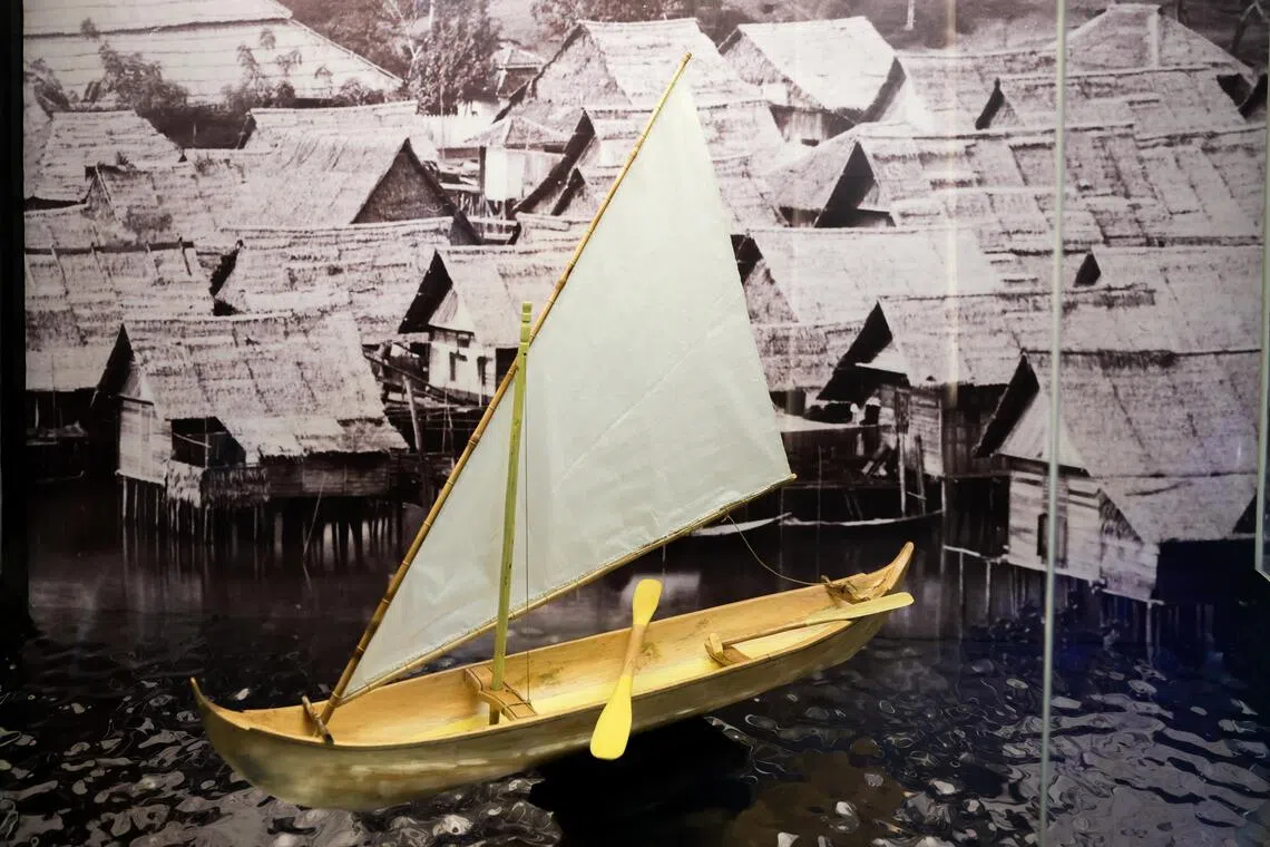 A model of a dugout sailboat is displayed in the revamped Singapore History Gallery at the National Museum of Singapore on Sept 29.