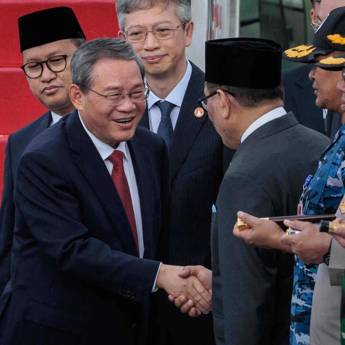 Chinese Premier Li Qiang being greeted by Indonesian officials upon his arrival in Jakarta on May 24. 