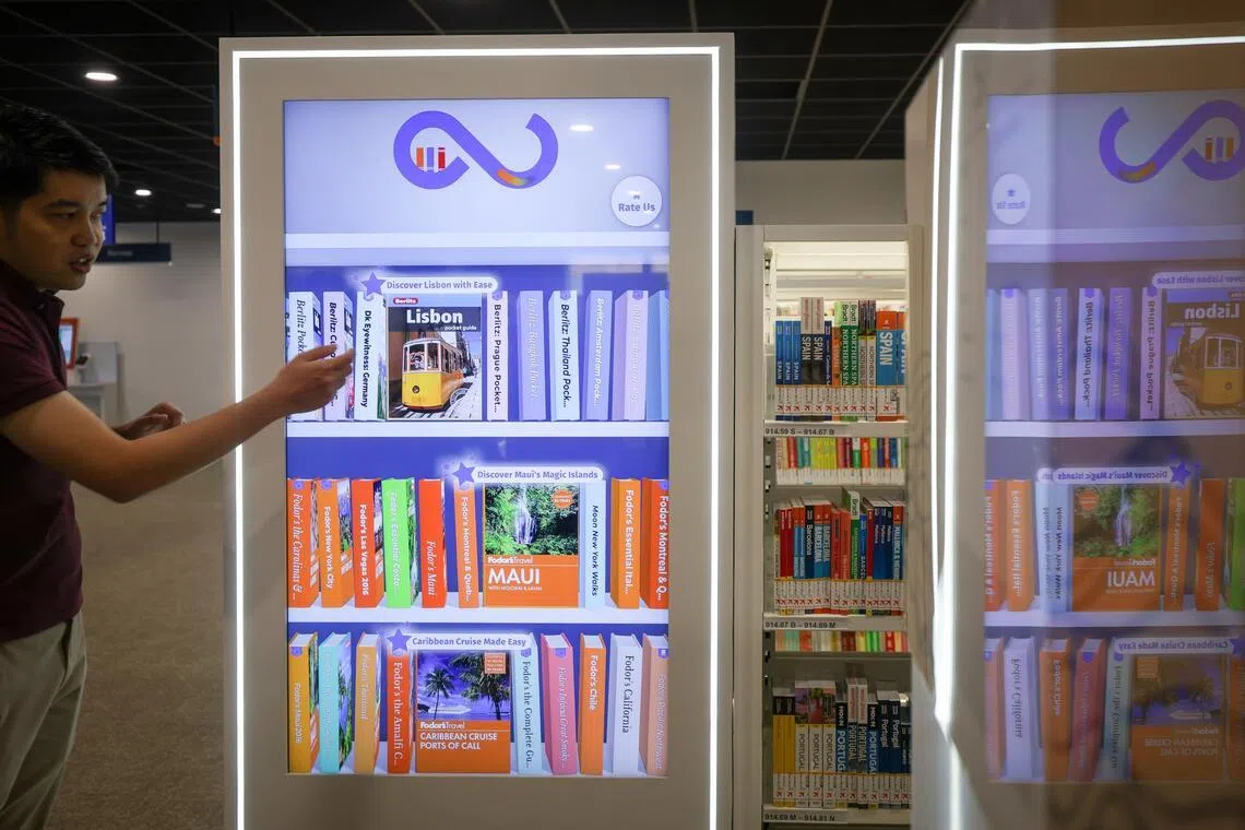 Interactive displays, known as Infinite Shelves, along the travel, health, and adult fiction sections, offer visitors the chance to explore e-book recommendations within those genres.