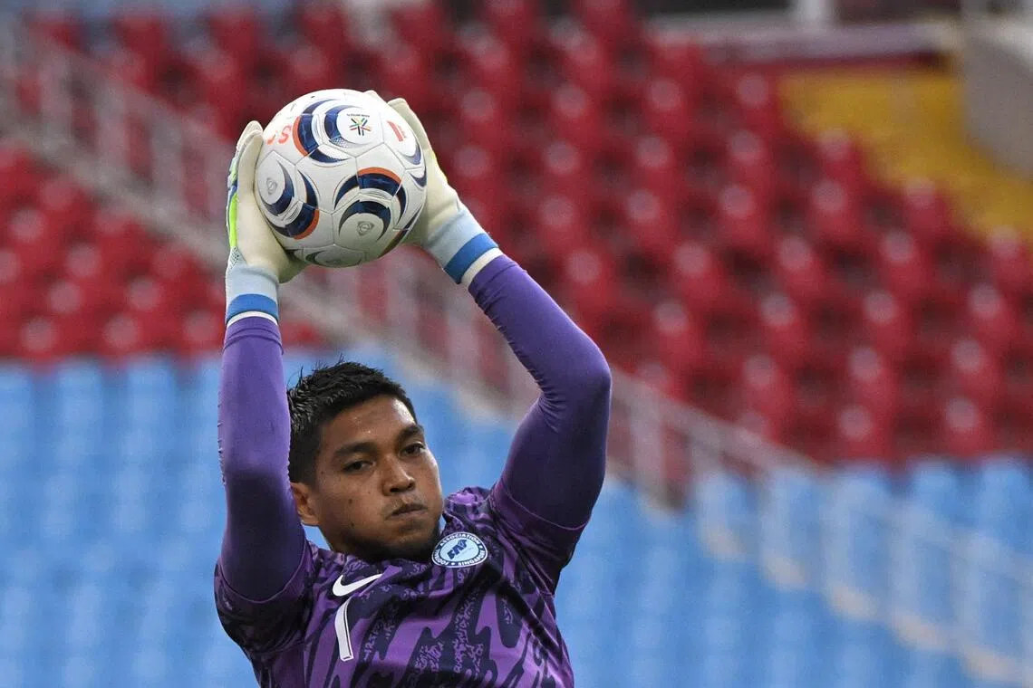 Singapore goalkeeper Izwan Mahbud going through the paces during a training session at the My Dinh National Stadium in Hanoi on July 30.